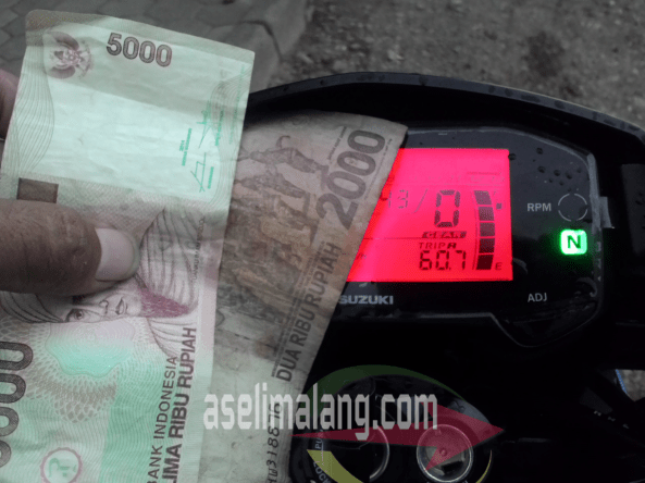IDR 20.000 kembalian IDR 7.000